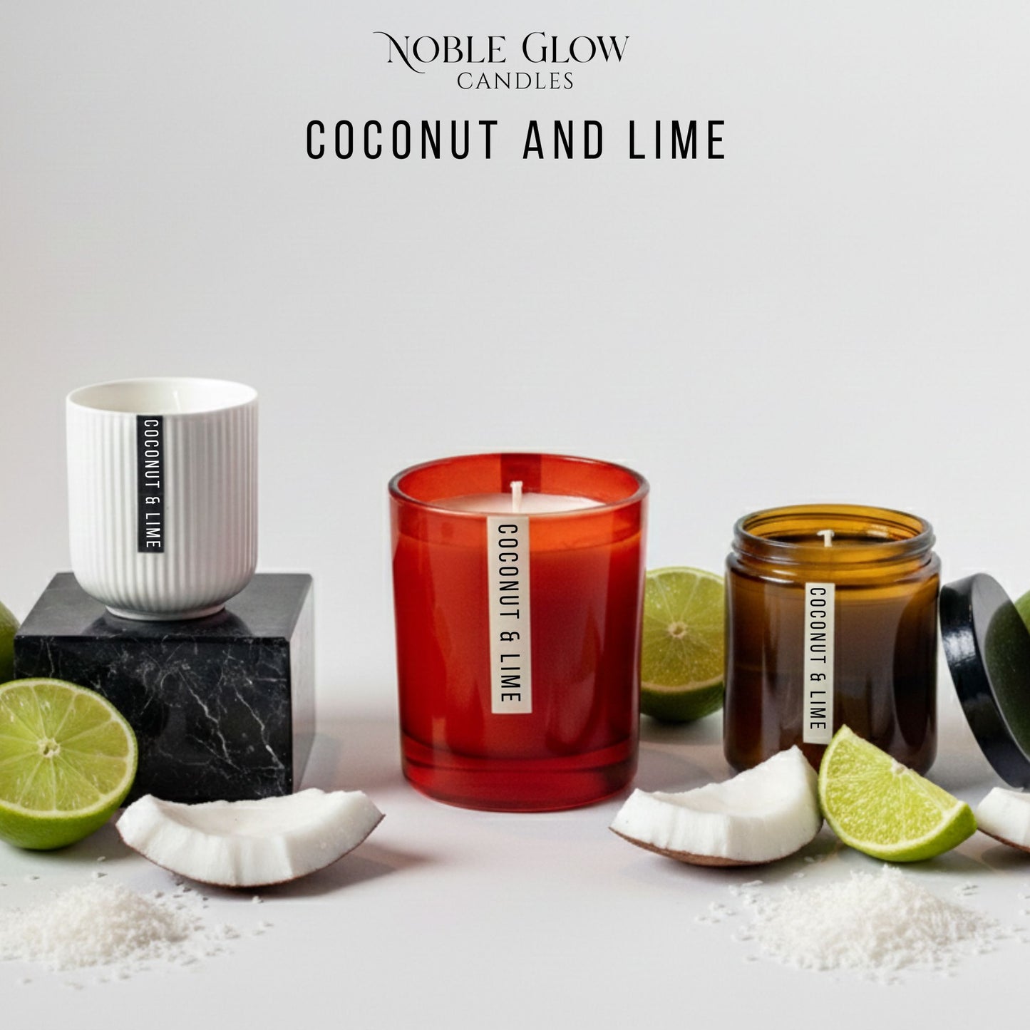 Coconut and lime scented candles from Noble Glow on a light background with limes and coconuts.
