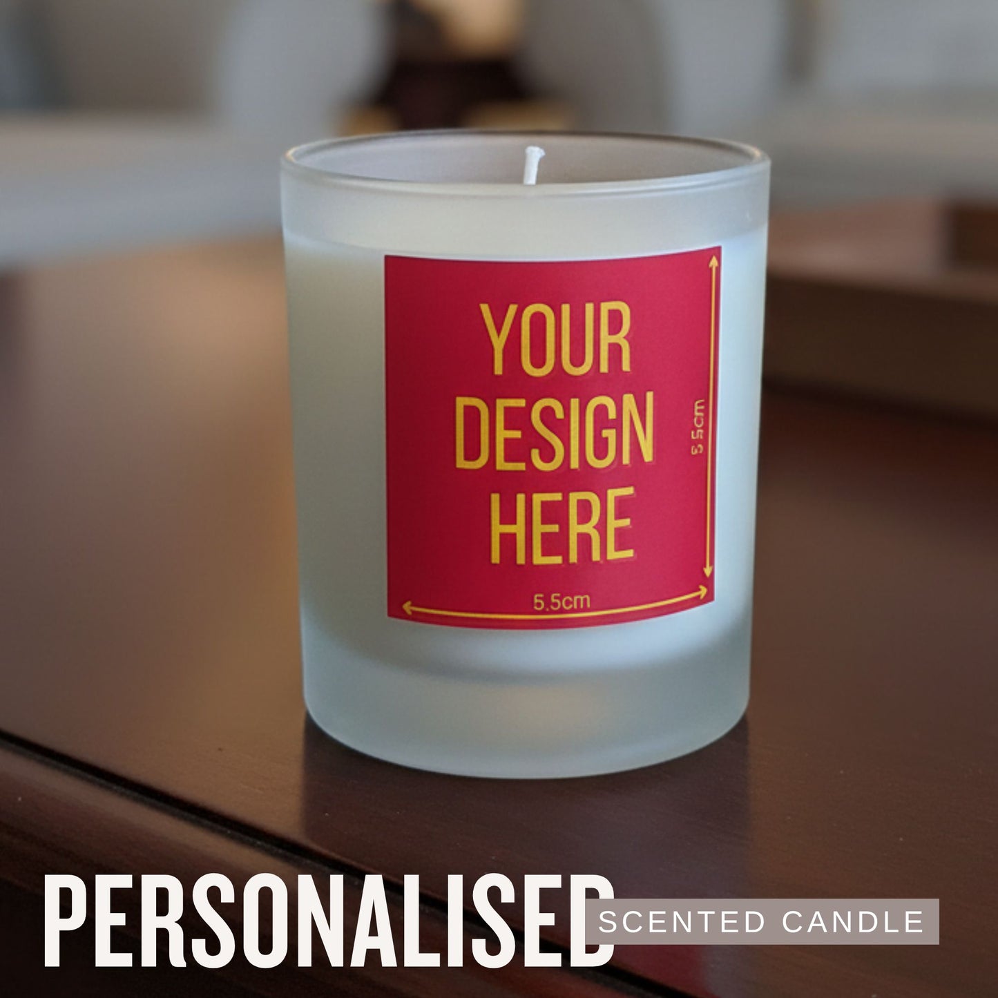 Personalised scented candle with a red label on a wooden surface