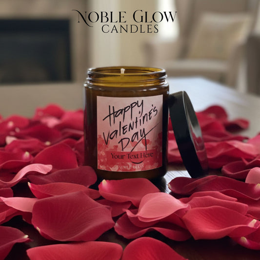 Candle with a Valentine's Day label on red rose petals, branded 'Noble Glow Candles'.