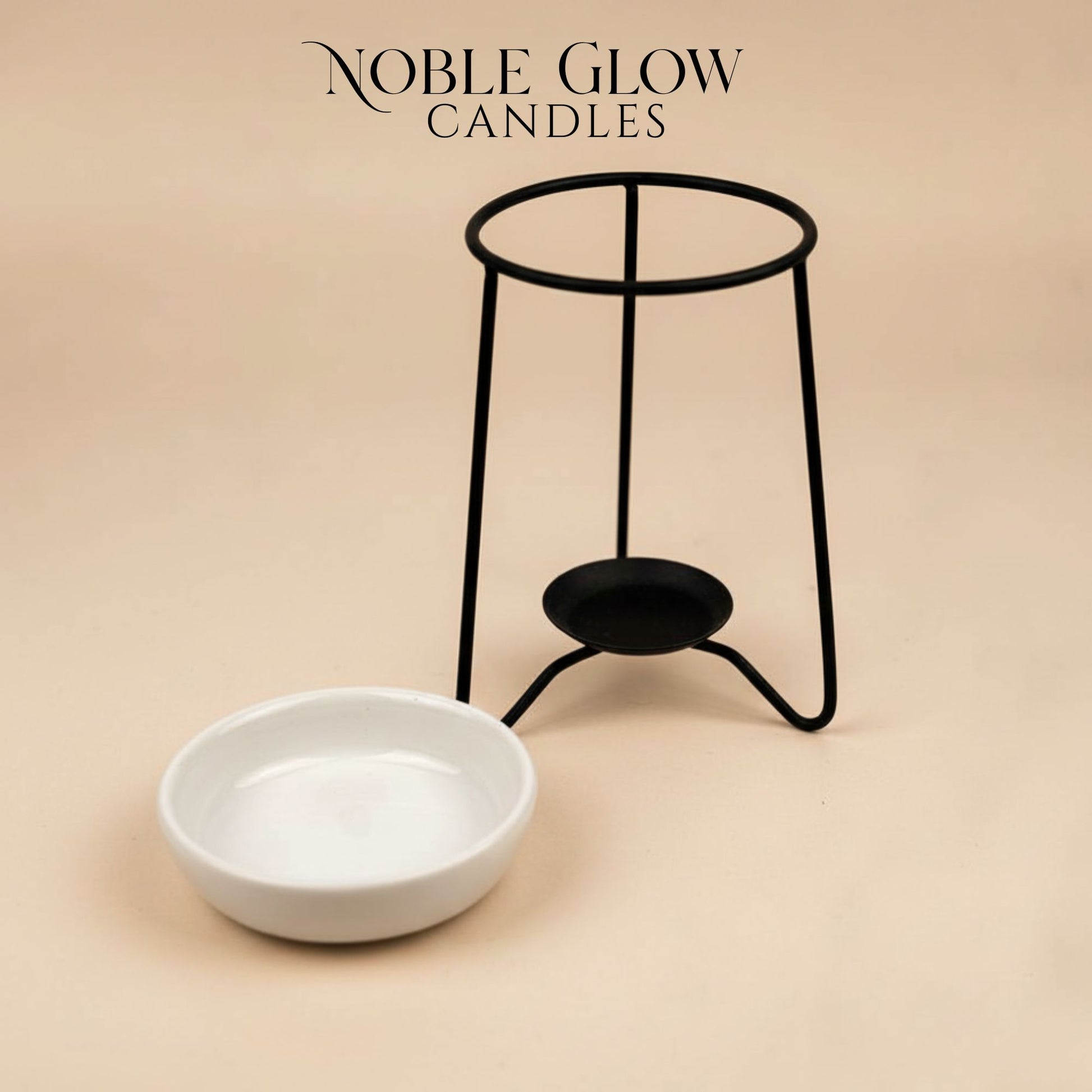 Black candle holder and white bowl on a beige background with 'Noble Glow Candles' text.