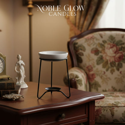 Noble Glow Candles product on a wooden table with decorative items in a warm-toned room.