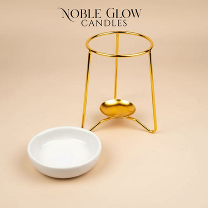 Gold candle holder and white bowl on a beige background with 'Noble Glow Candles' branding.