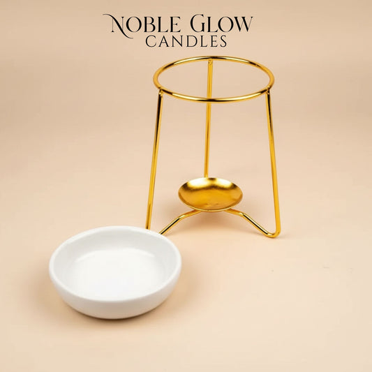 Gold candle holder and white bowl on a beige background with 'Noble Glow Candles' branding.