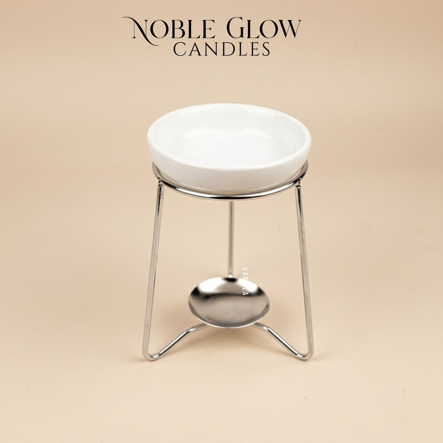 White ceramic candle holder with metal stand on a beige background, featuring 'Noble Glow Candles' branding.